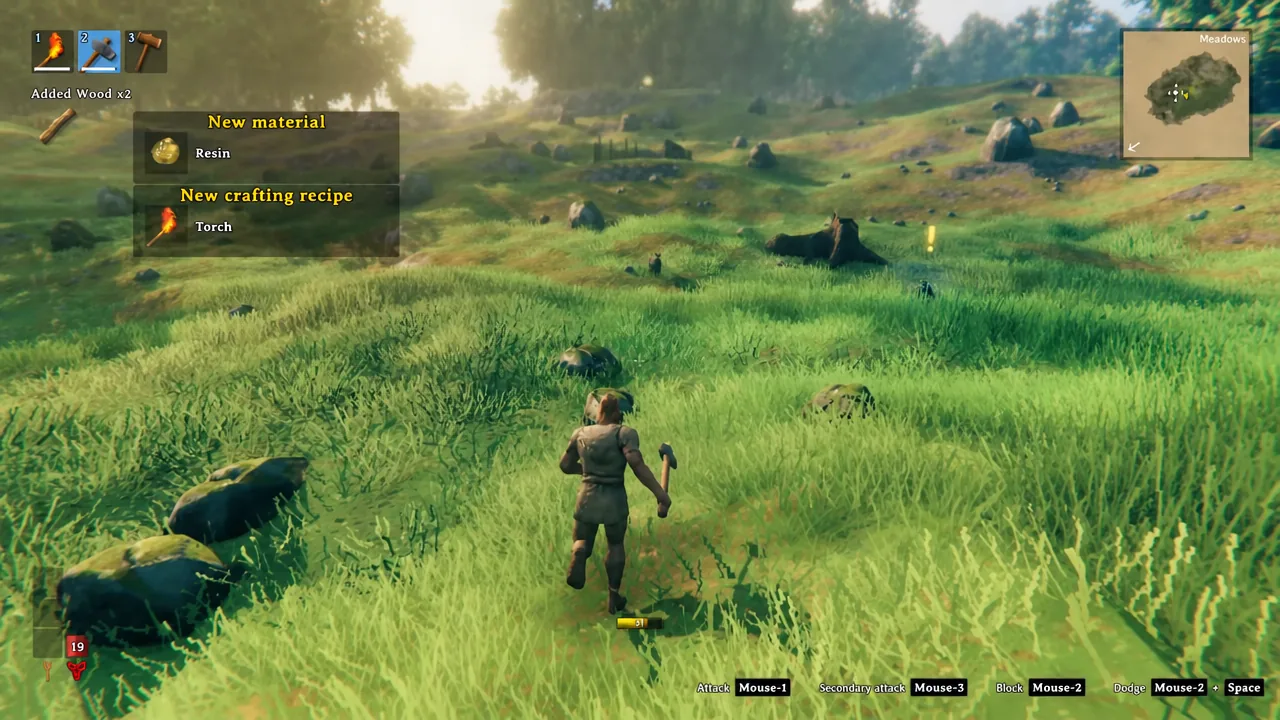 New crafting recipe notification showing the Torch unlocking after collecting wood