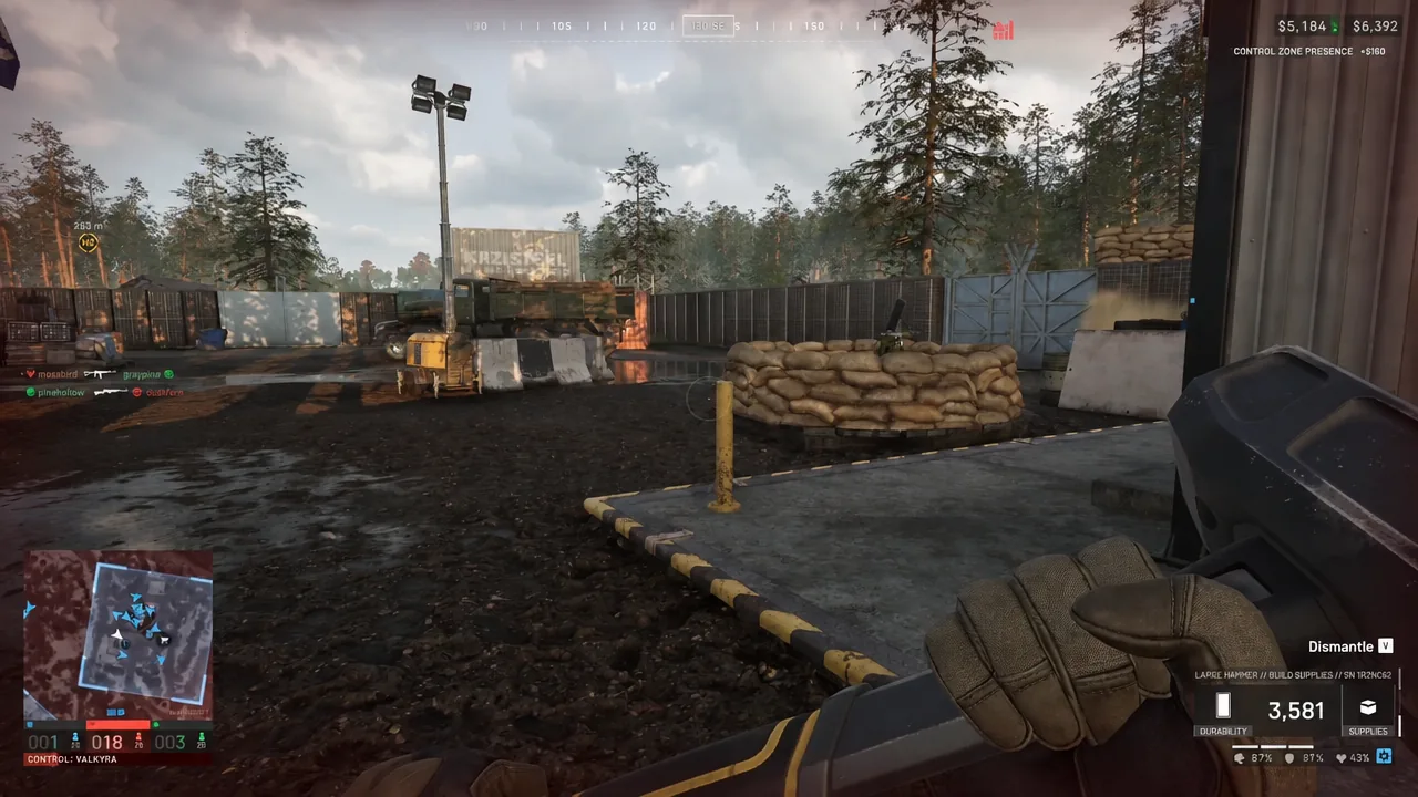 First-person view holding the hammer with the on-screen dismantle prompt showing