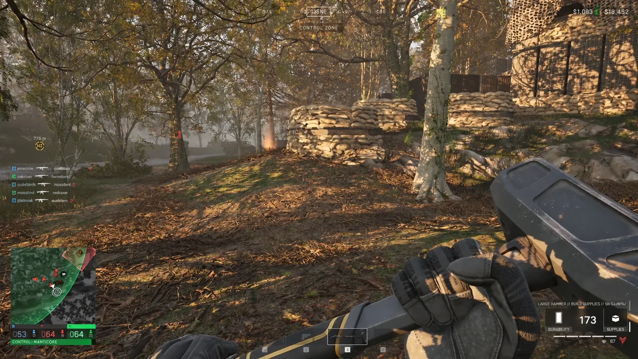 Player moving through woodland on the Control Zone map with the sledgehammer build tool drawn
