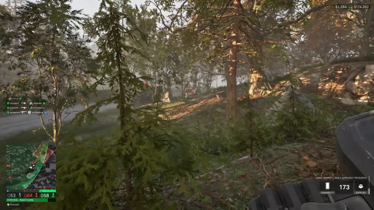 Wardogs player aiming a launcher through forest cover with the minimap and ammo HUD visible