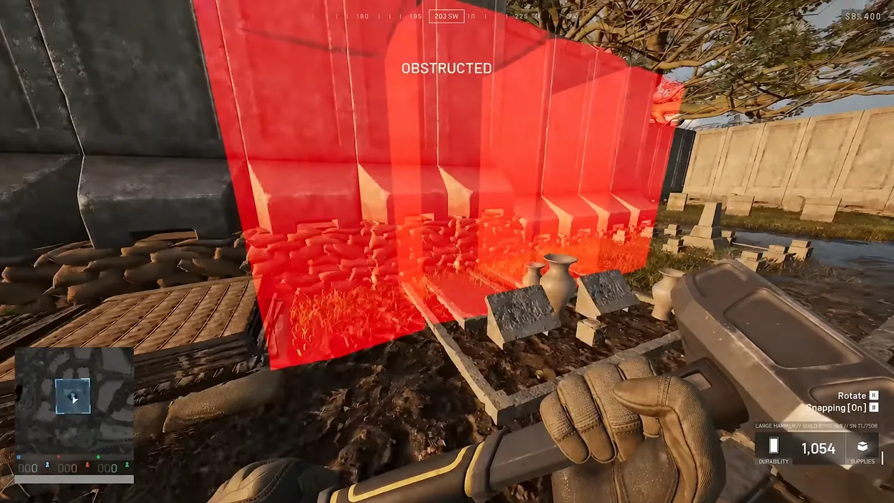 Red OBSTRUCTED placement preview with rotate and snapping controls shown on screen