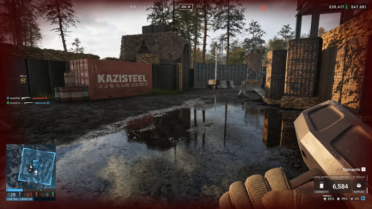 Large Hammer equipped in WARDOGS with the Dismantle prompt shown on screen