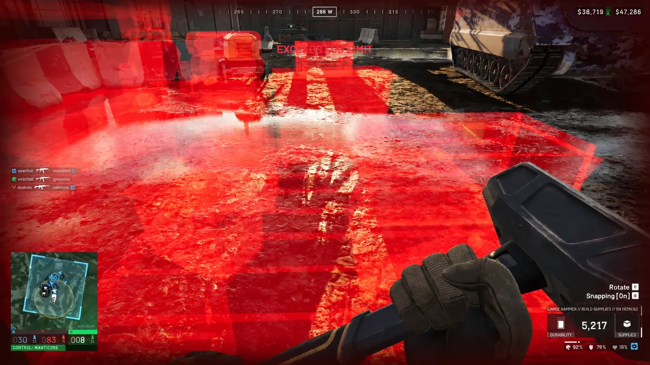 Red placement hologram in WARDOGS build mode with a build limit warning on screen