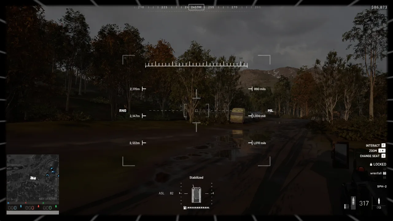Stabilized SPH-2 gunner sight lined up on a distant vehicle, with the range and mil scales either side of the reticle