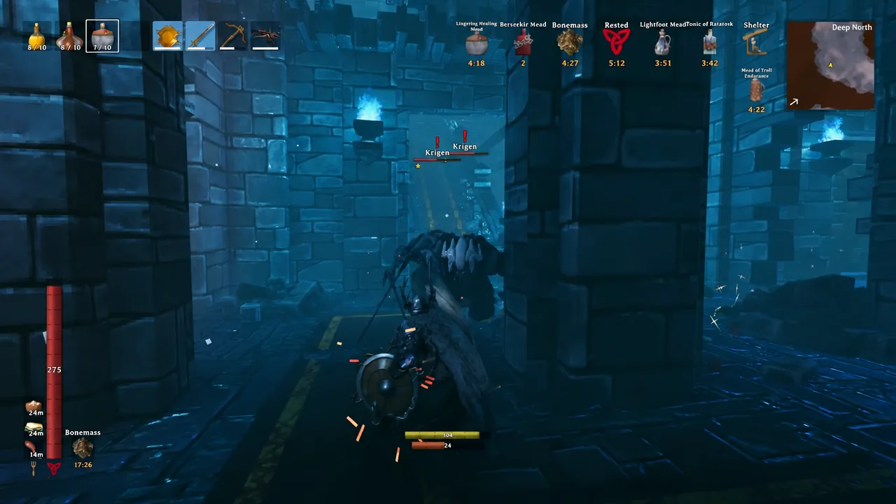 Player fighting Krigen enemies inside a Deep North dungeon with a sword equipped