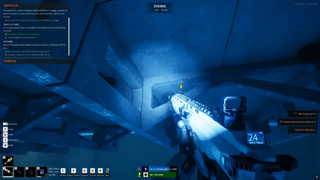 Player diving underwater toward a yellow waypoint marker with the quest panel open