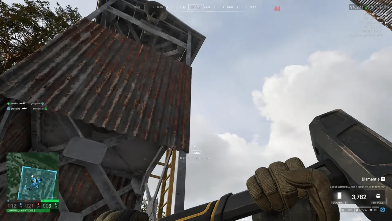 Dismantle prompt appearing on a corrugated-metal structure while holding the Large Hammer