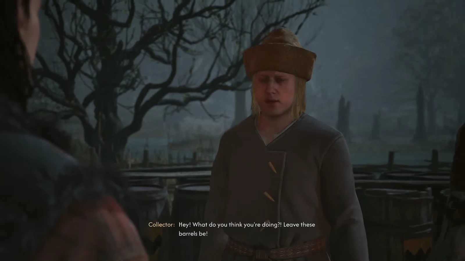 A Collector confronts Coen next to the barrels and tells him to leave them alone