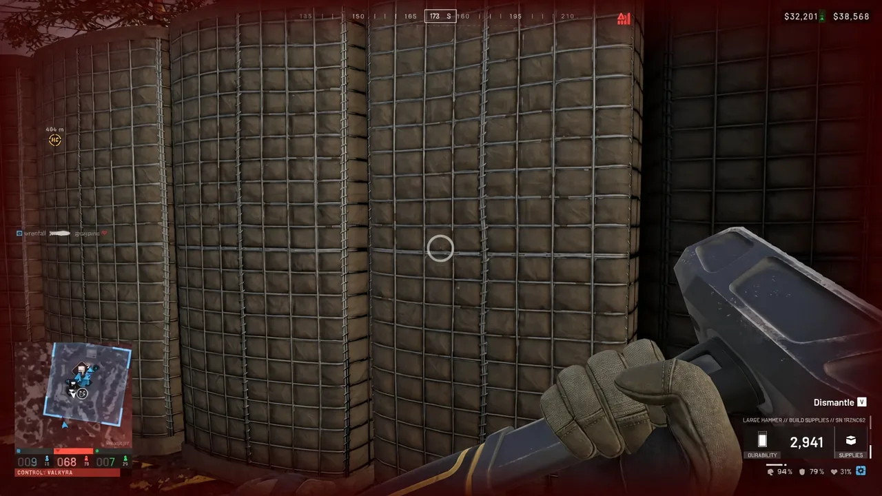 Large Hammer equipped with the Dismantle V prompt showing on a targeted barrier wall