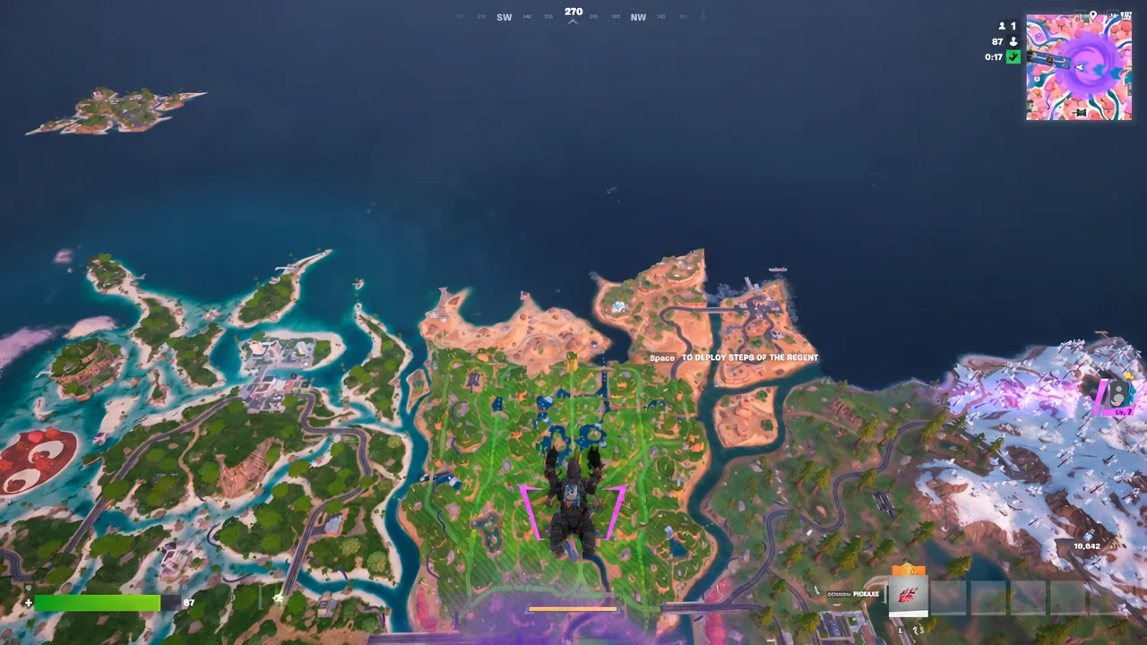 Descending toward the island with the glider deploy prompt on screen during the drop