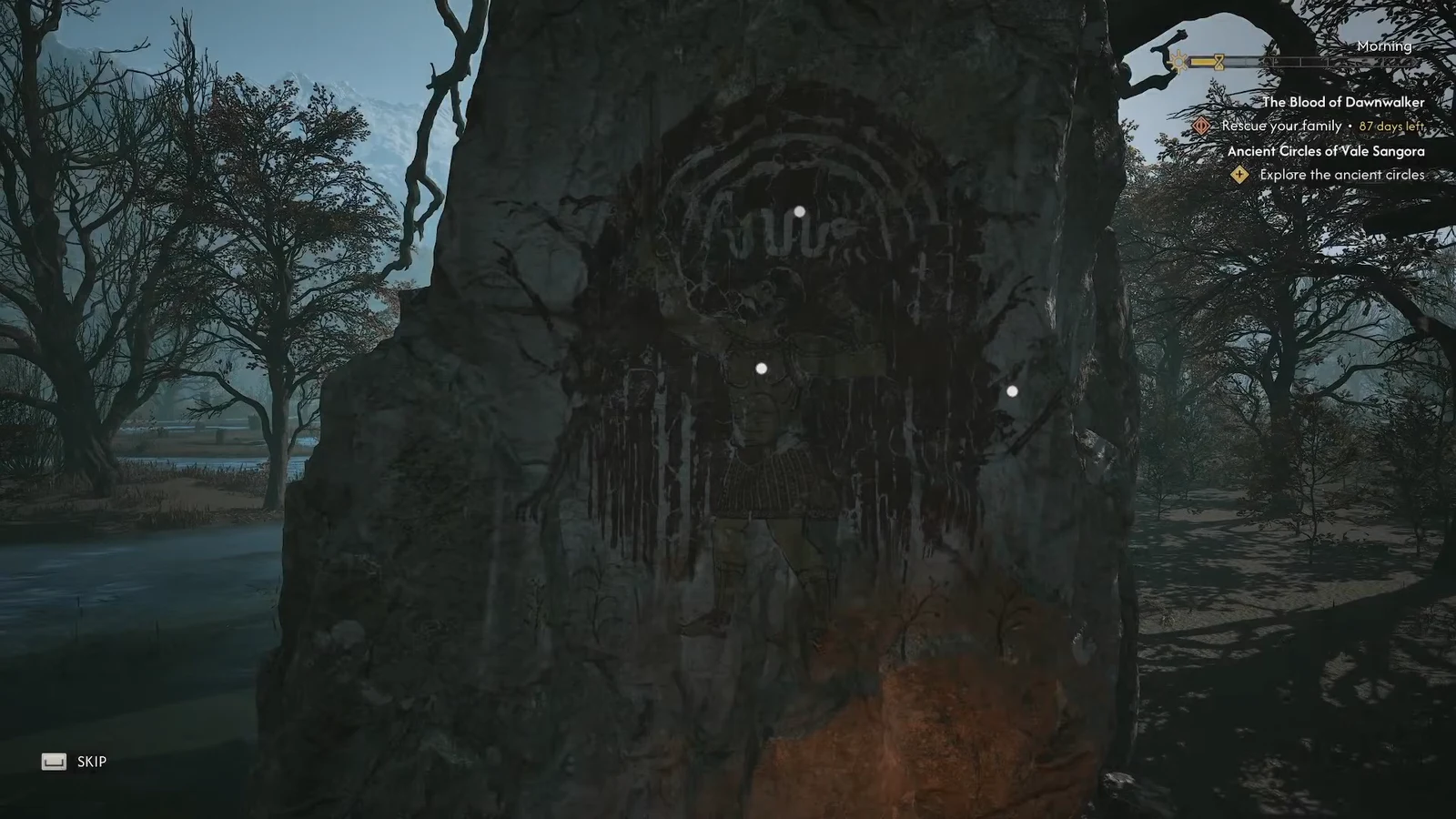 Carved stone monument with glowing Focus inspection markers during a short cutscene