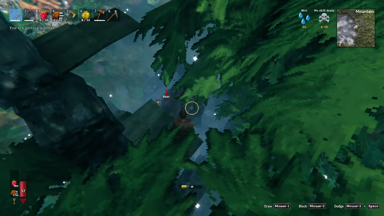 Player crosshair lined up on a boar with attack and block prompts visible on screen
