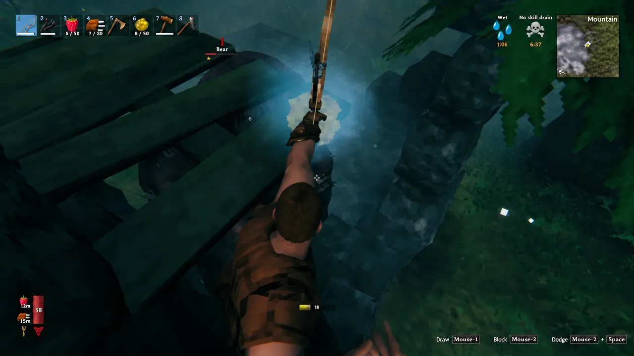 First-person view of a drawn bow aimed down at a bear from elevated ground