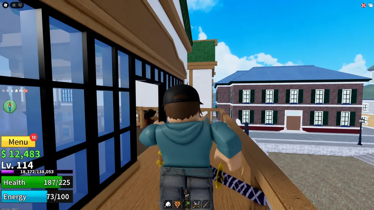 Player standing on the upper balcony of the Middle Town building with a sword equipped