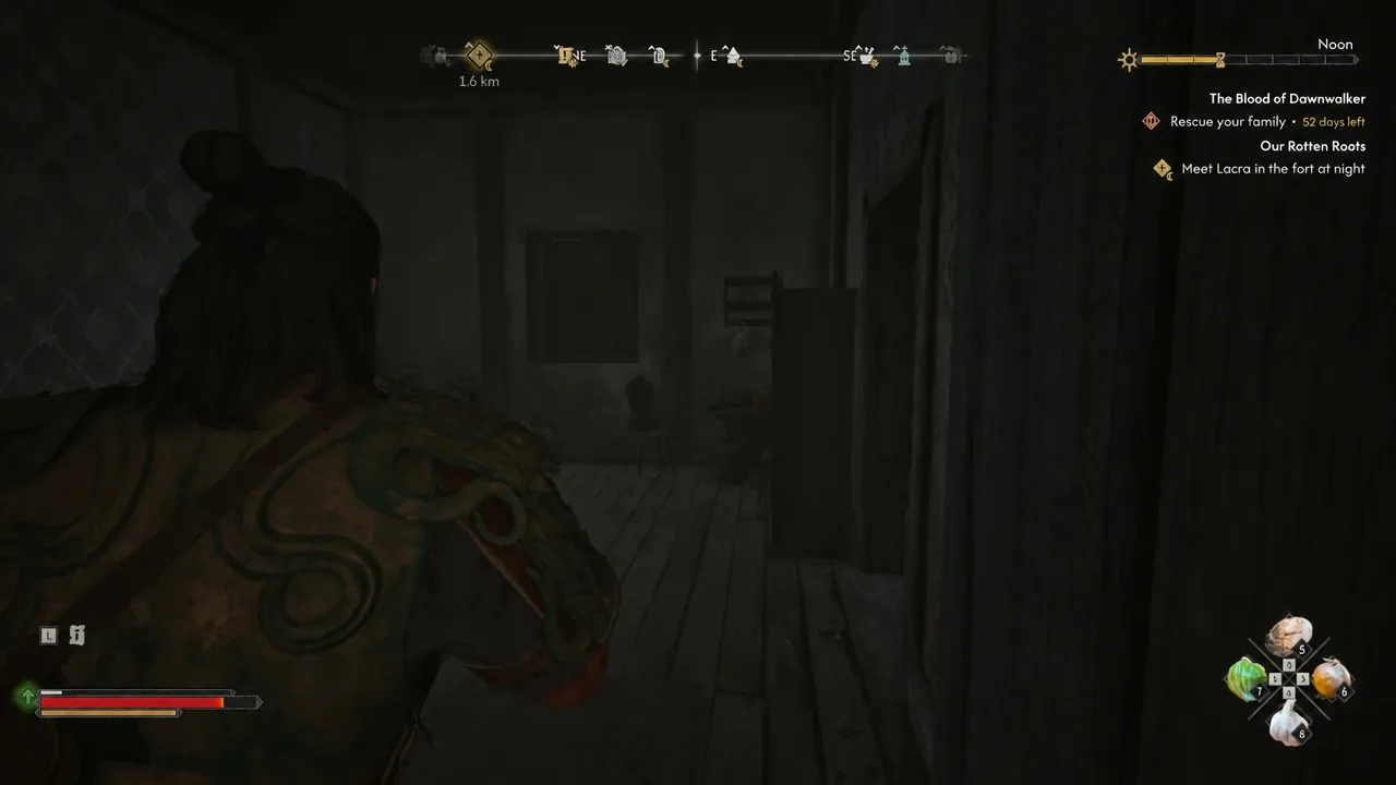 Quest tracker showing a new objective as Coen walks through the dark interior toward the stairs