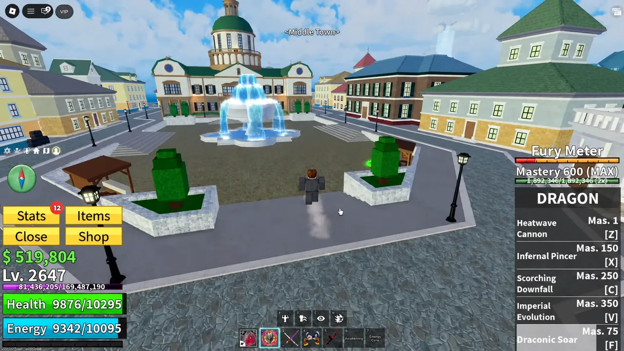 The large green-roofed town hall behind the fountain in Middle Town