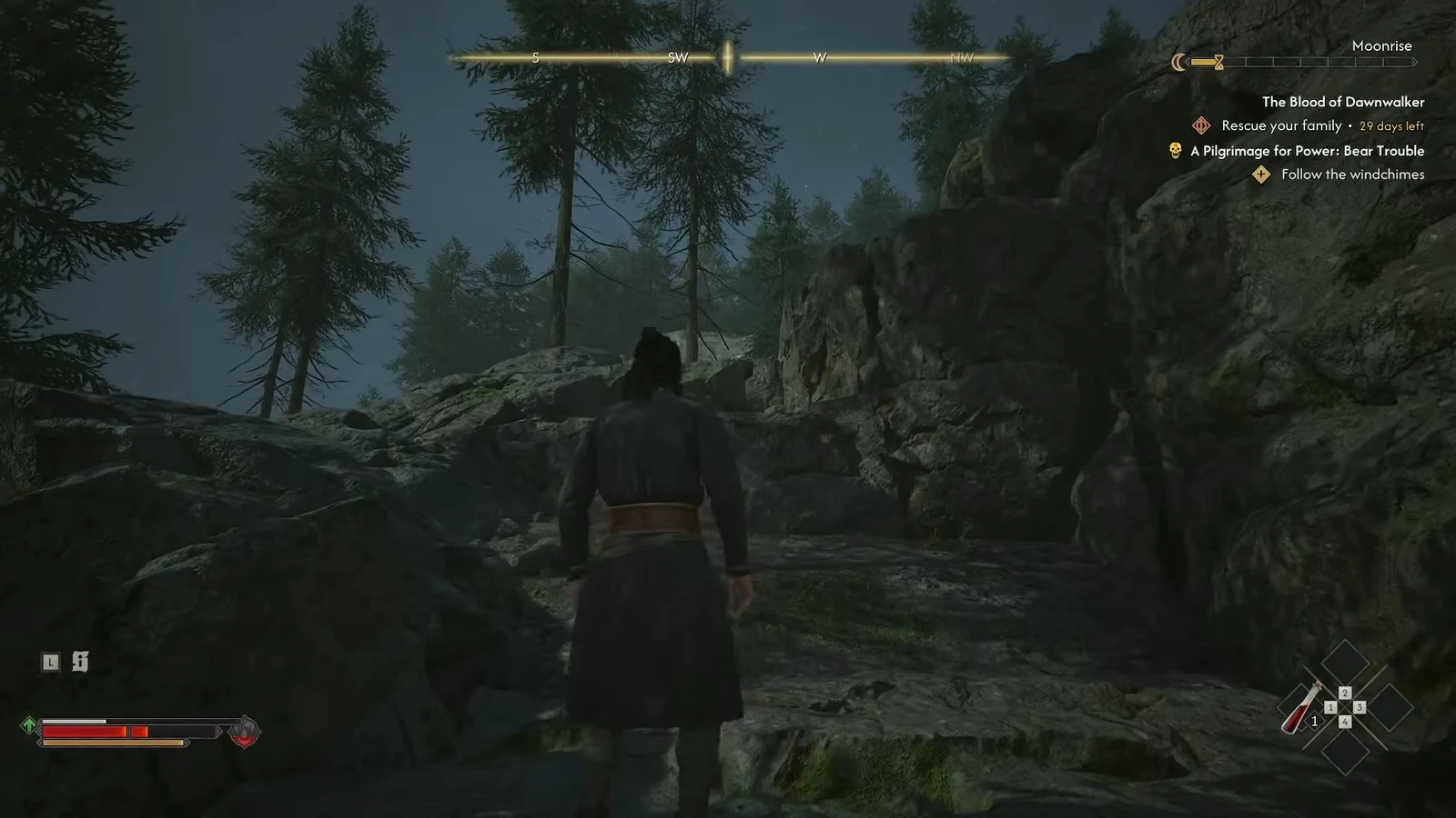 Coen walking a rocky forest path with the Follow the windchimes objective tracked on the HUD
