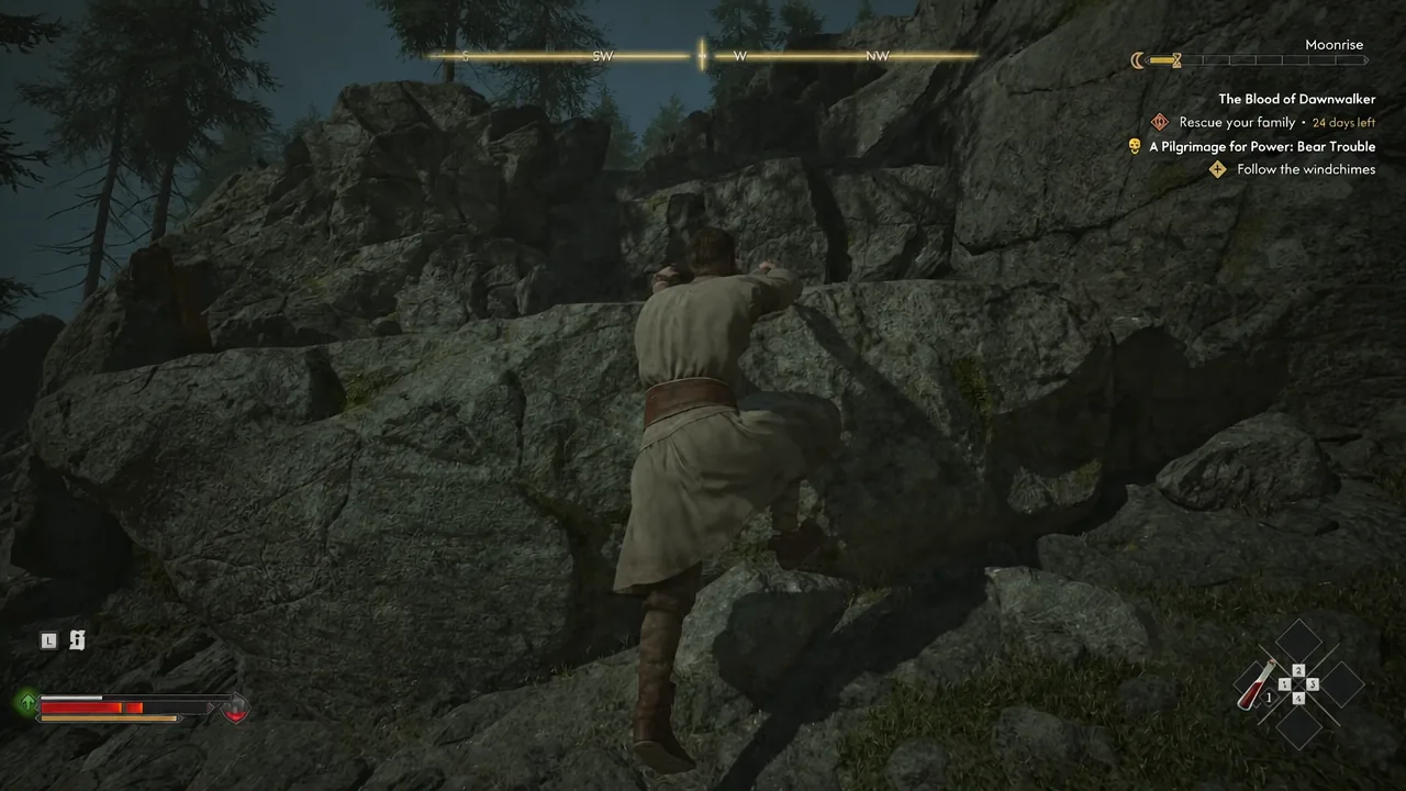 Coen pulling himself up a rocky ledge with the Follow the windchimes objective on screen