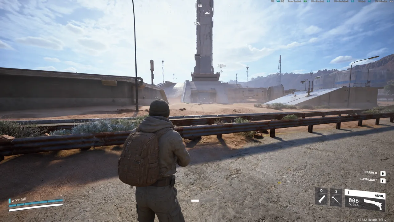 ANVIL weapon HUD and crosshair as the player aims across an industrial yard at a flying ARC