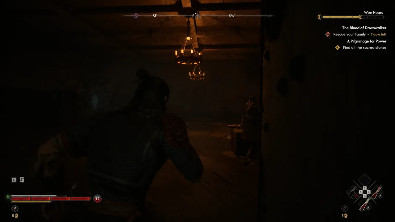 Dim stone interior of the tower as Coen starts climbing toward the upper floors
