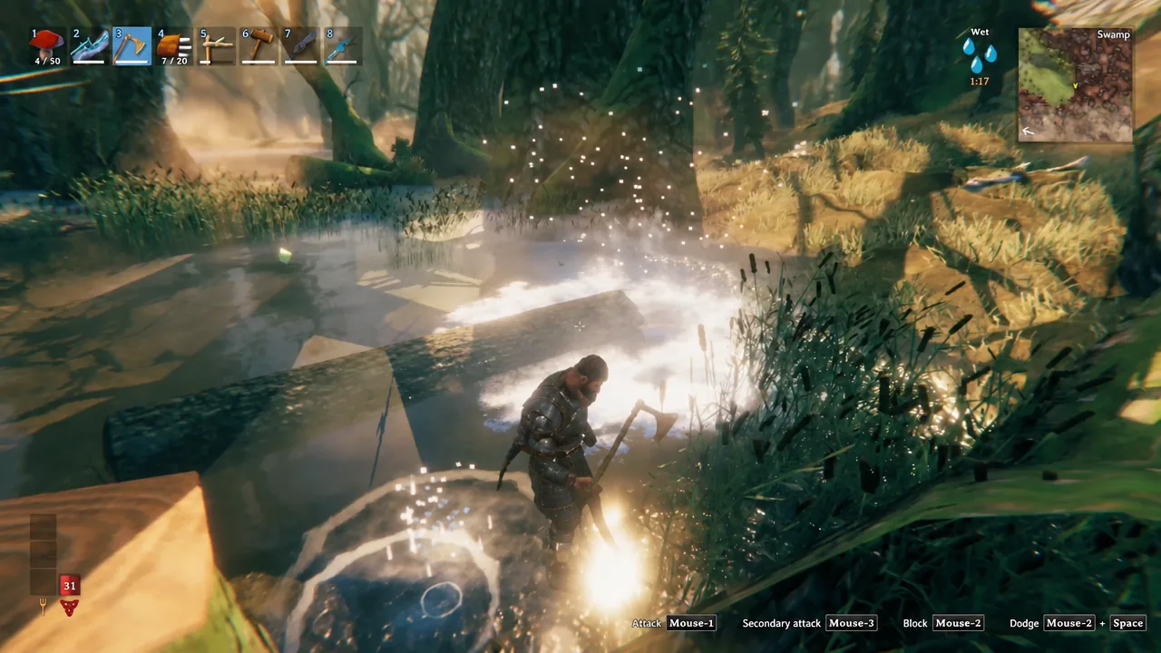 Player swinging an axe at a felled Ancient Tree log in the Valheim Swamp