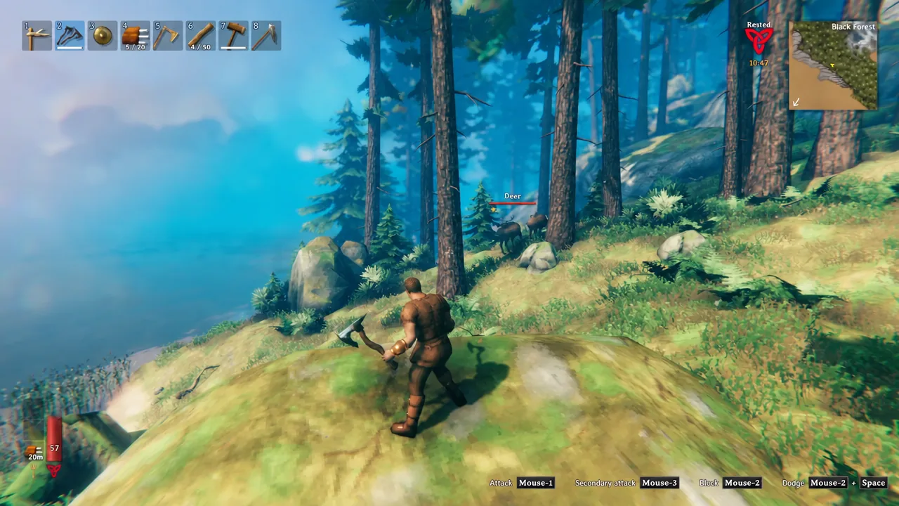 A deer marked ahead of the player, who is holding an axe on the way toward the tree line