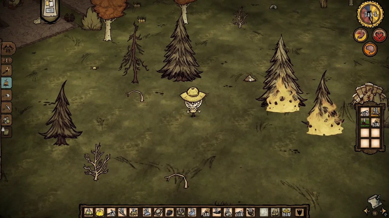 Player picking up Ashes left on the ground after a burned evergreen.