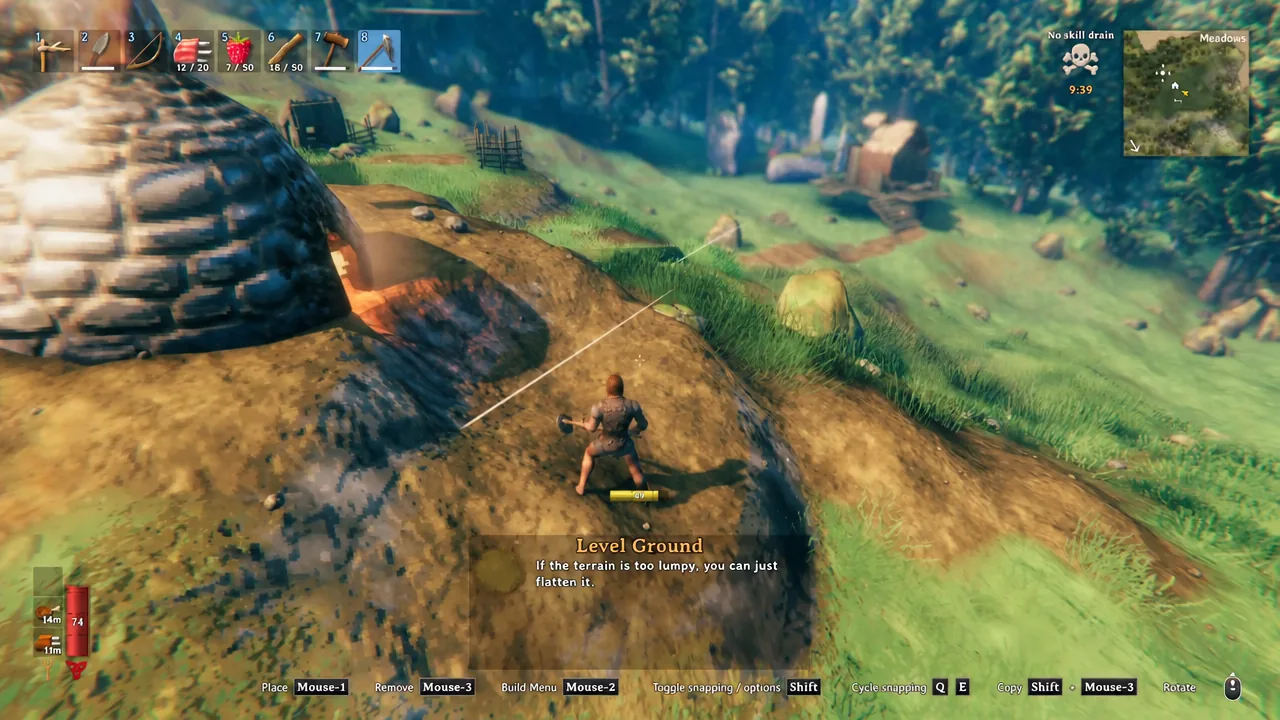 Levelling the terrain around the kiln keeps ejected coal within arm's reach.