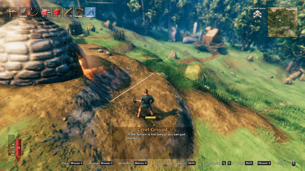 Player feeding logs into the front of a lit Charcoal Kiln in Valheim