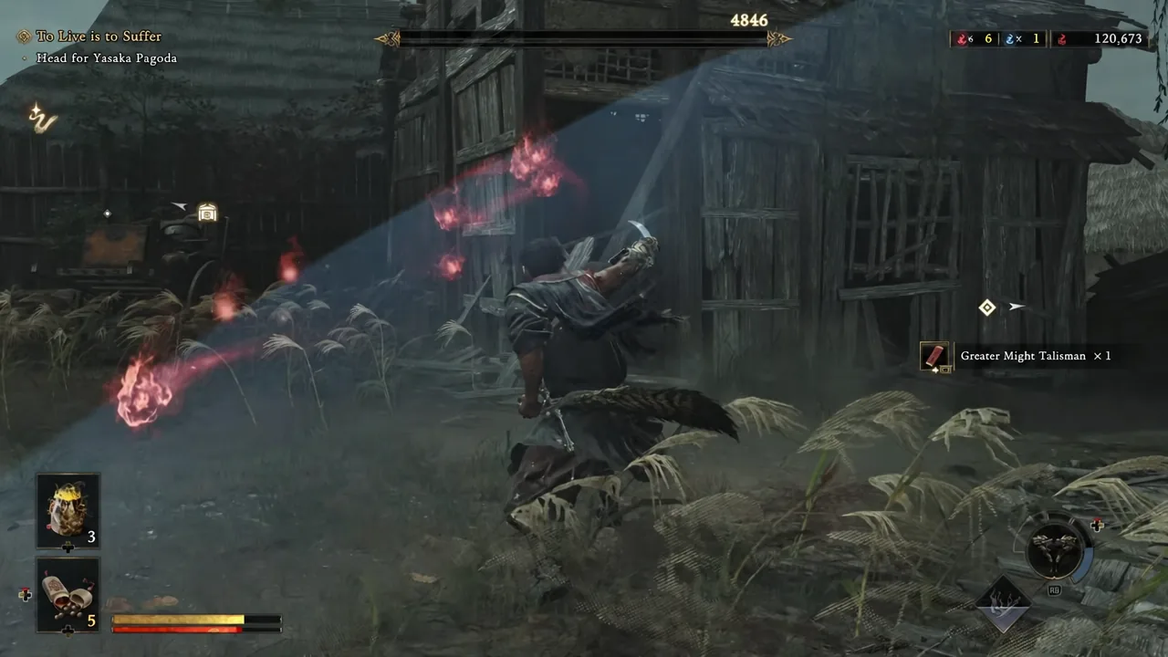 Pickup notification showing Greater Might Talisman x1 during exploration in Kyoto