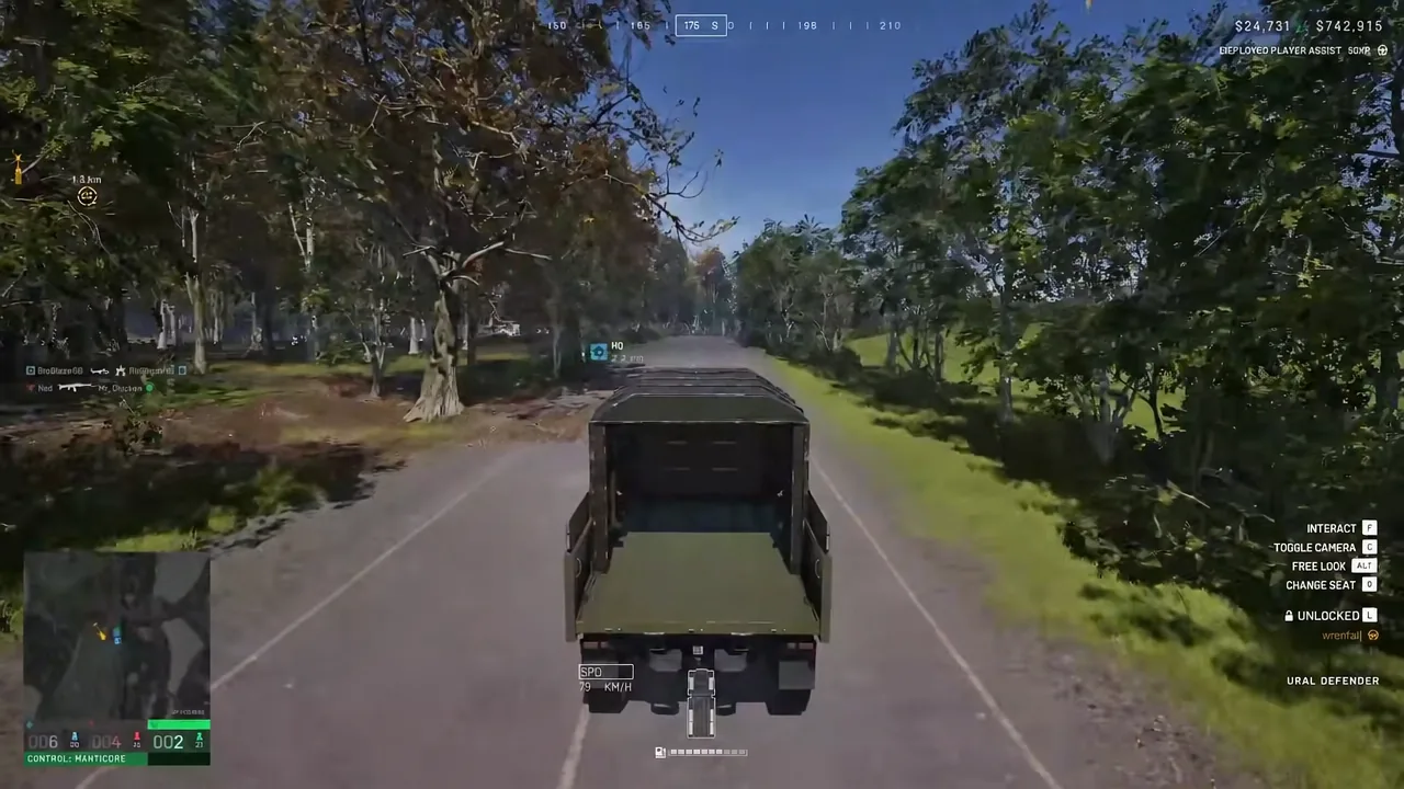 Supply truck on a road with interact, toggle camera, free look and change seat prompts on screen