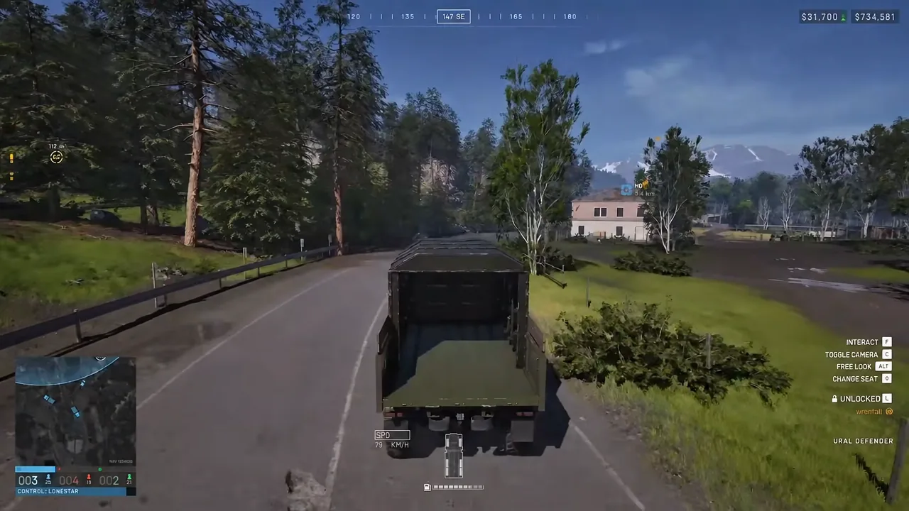 Ural Defender driving forward with the vehicle name and control prompts shown on the HUD