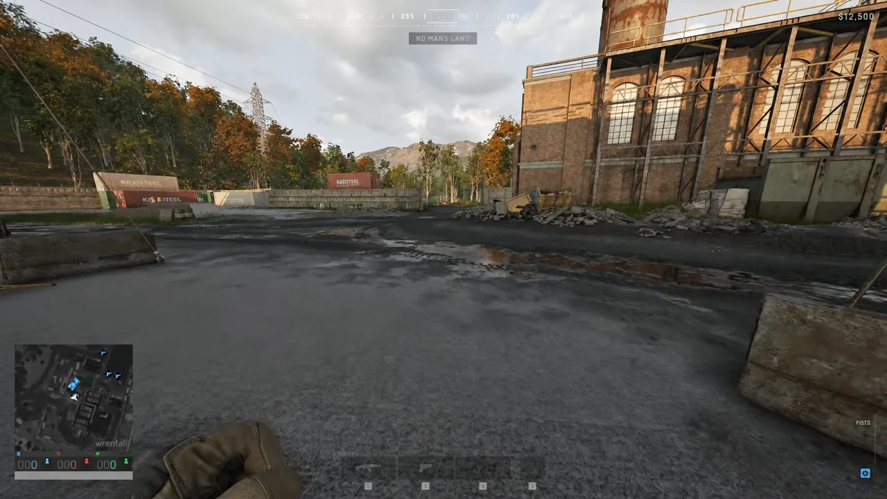 Player on foot in an industrial yard in Wardogs with fists equipped and no vehicle nearby