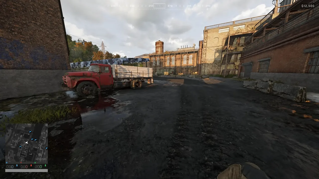 Player crossing an industrial yard in Wardogs while heading for the Vehicle Vendor marker