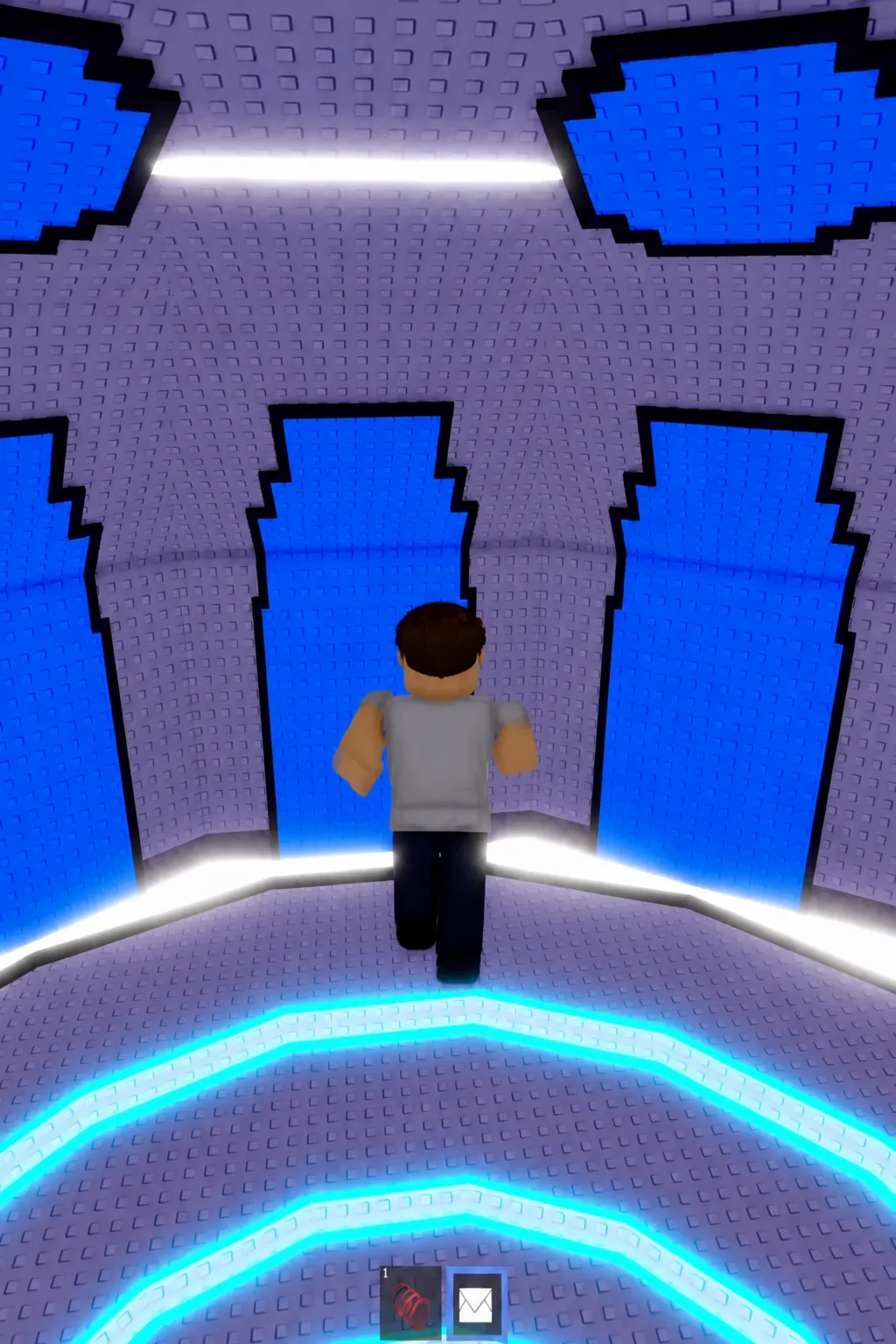 Interior view of the UFO with blue wall panels ahead and the hotbar at the bottom