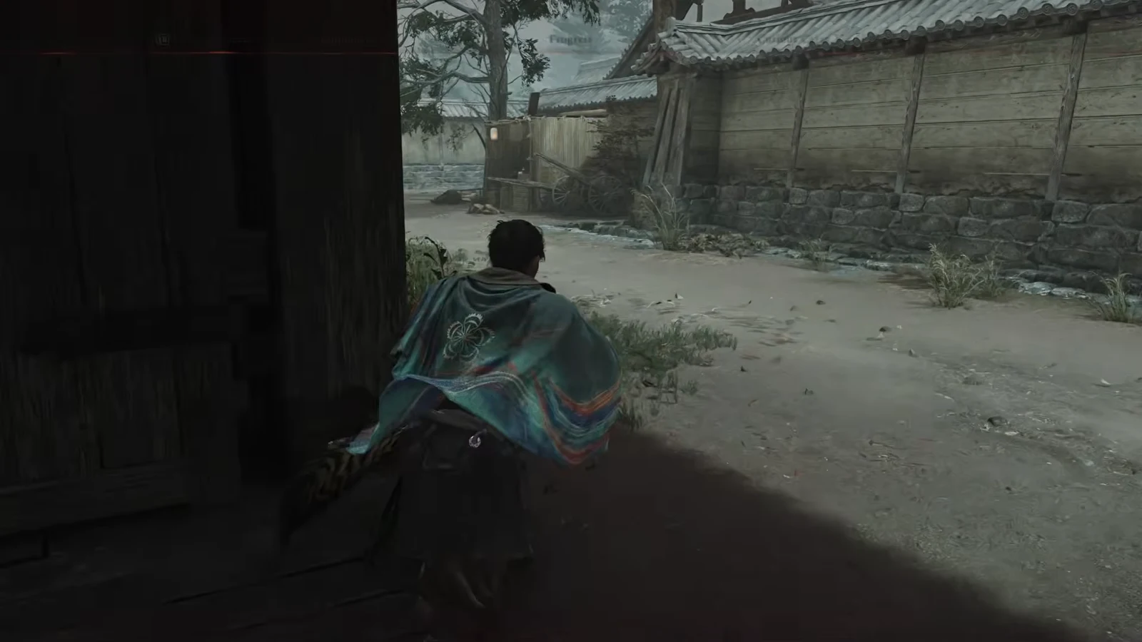 Musashi crouching out of a dark wooden doorway into a village courtyard
