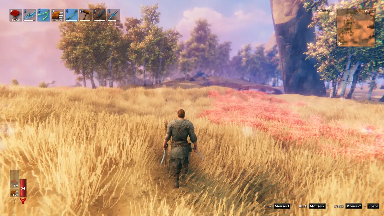 Player walking through the tall golden grass of the Plains biome with the survival HUD visible