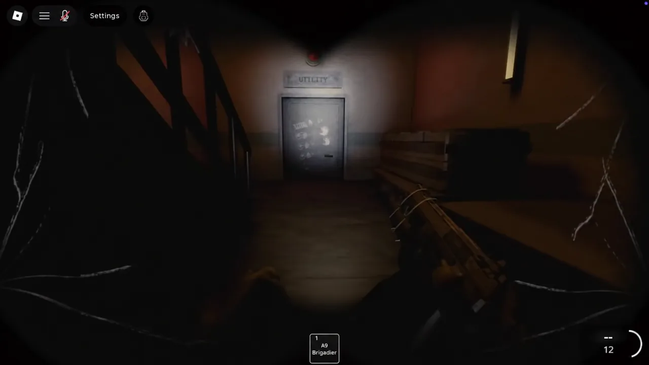 Player approaching the Utility door with the A9 Brigadier raised and aimed ahead