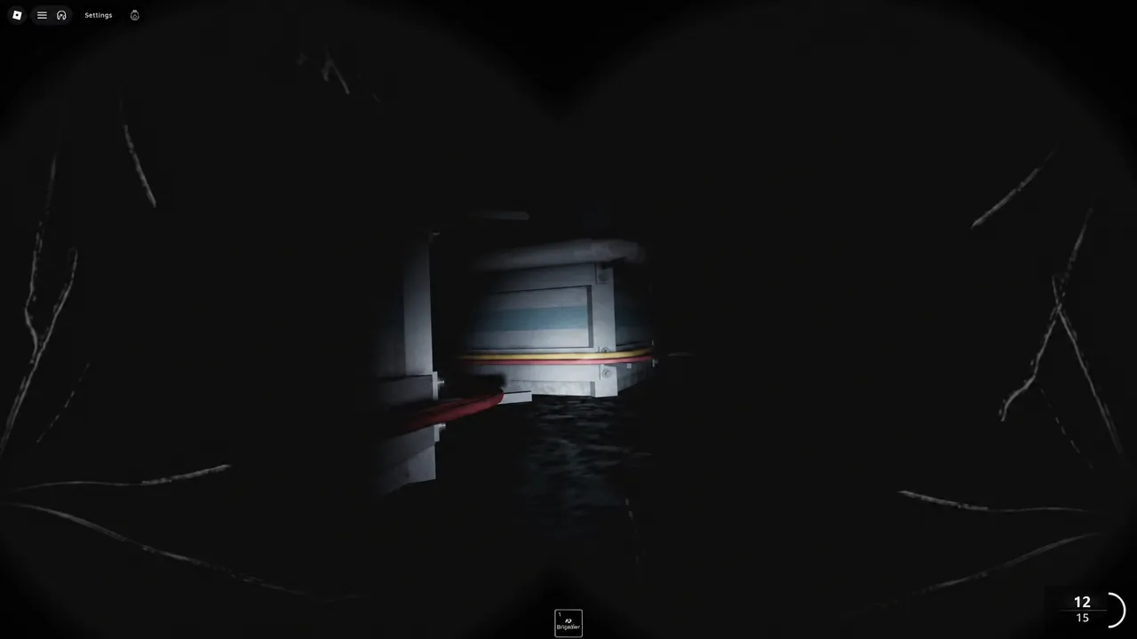 Player using a red crowbar on a metal hatch inside a dark tunnel passage