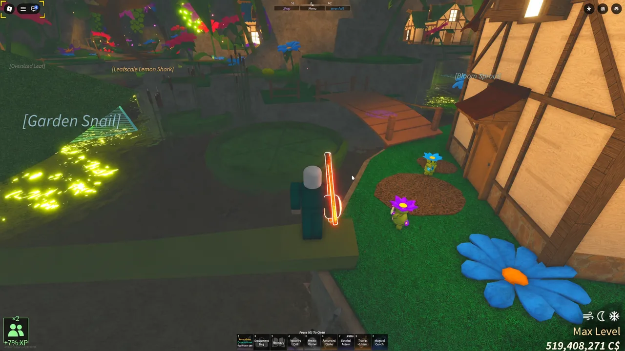Standing beside the garden patch and house at the back of the Living Garden at the end of the escort