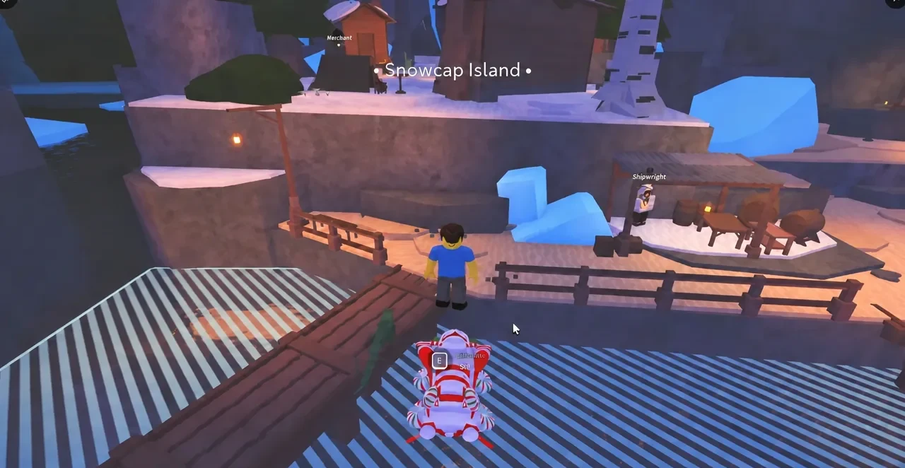 Snowcap Island shoreline in Fisch with an E interaction prompt highlighted over a red and white creature