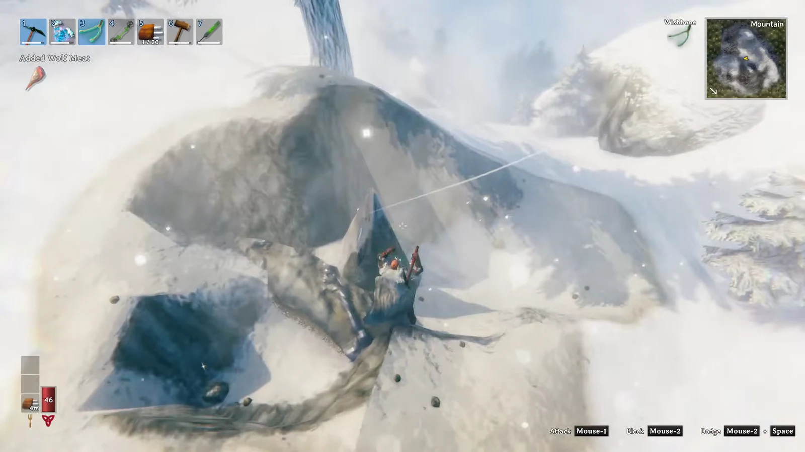 Player sweeping across snowy Mountain terrain with a Wolf Meat pickup notice on the HUD