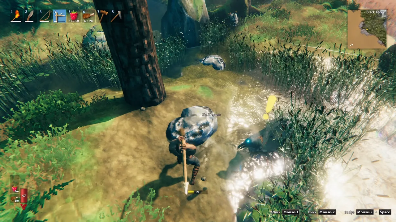 Valheim hotbar with the pickaxe in slot four selected as the player breaks apart a tin deposit