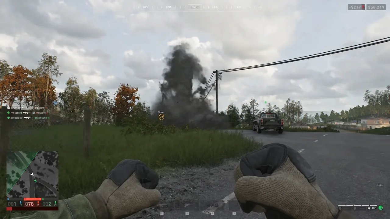 Detonation viewed from cover, with a fireball and smoke rising from the planted charge