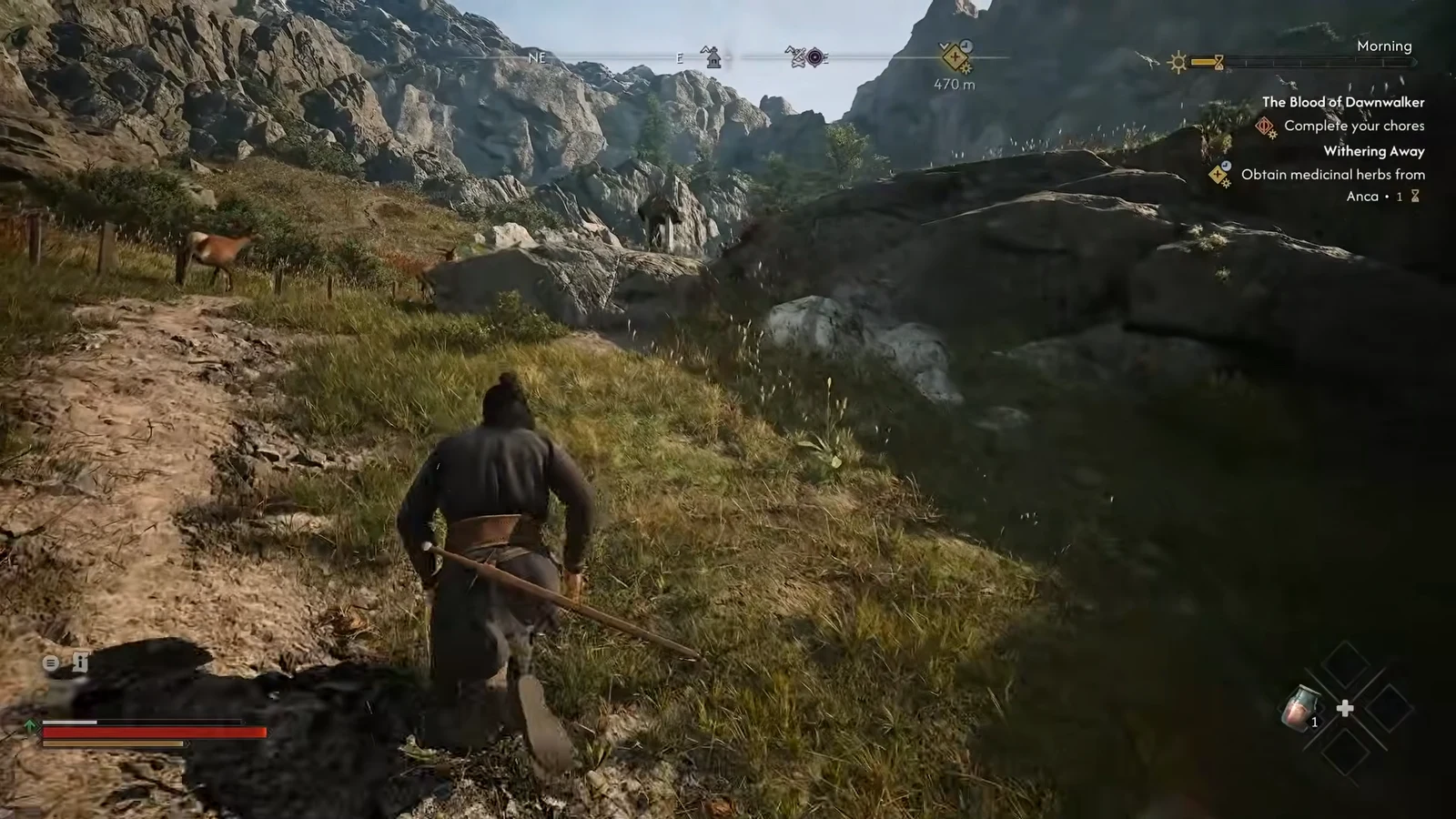 Quest tracker showing Withering Away while Coen follows a mountain path toward Anca
