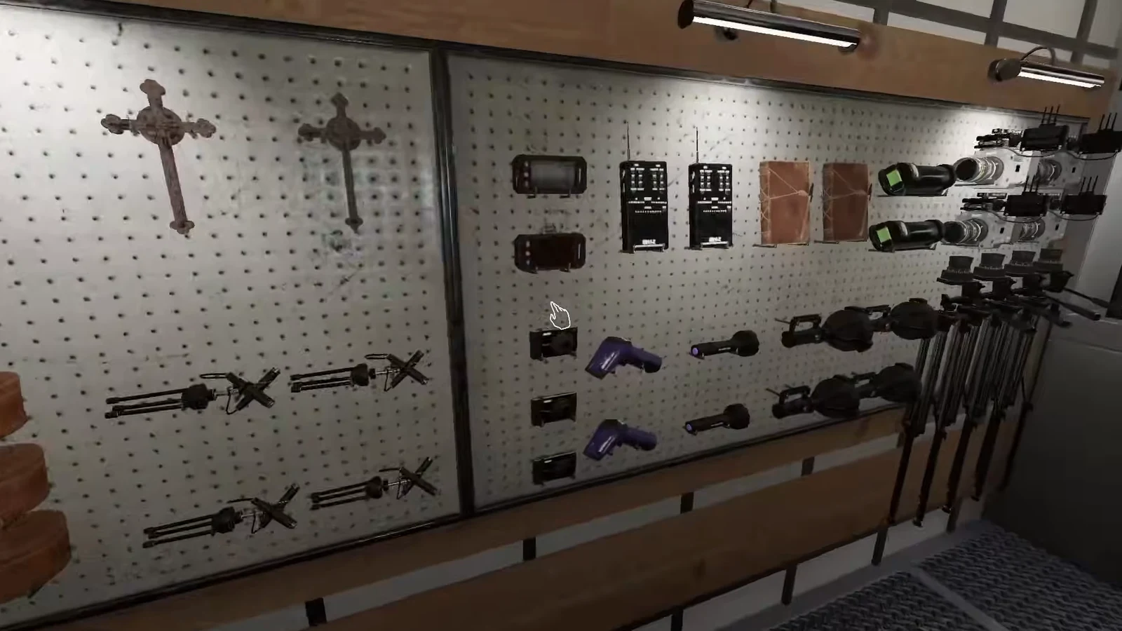 Equipment wall in the van with the cursor hovering over a small handheld device