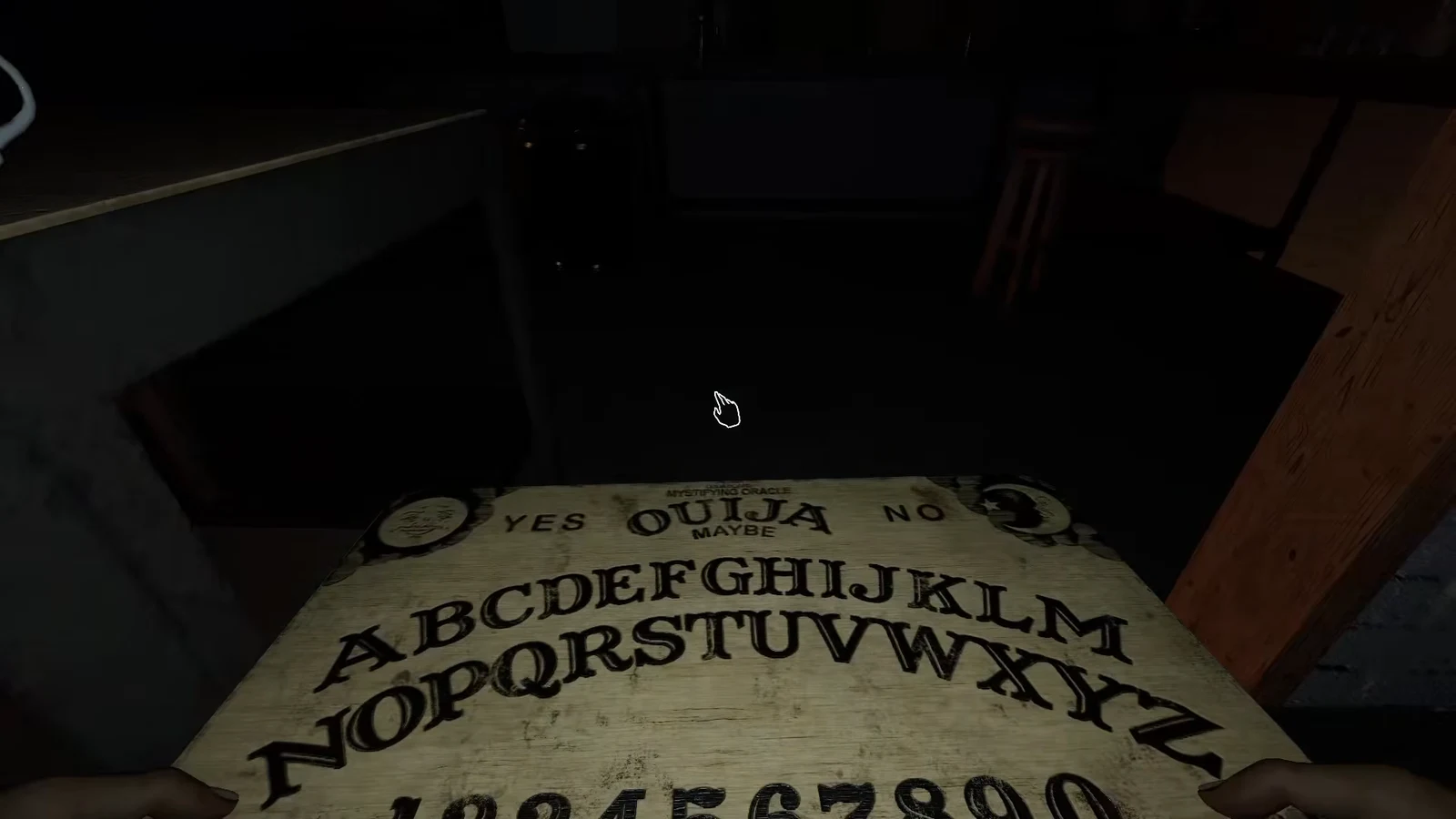 An Ouija board on the floor with the interaction cursor hovering over it before a hunt