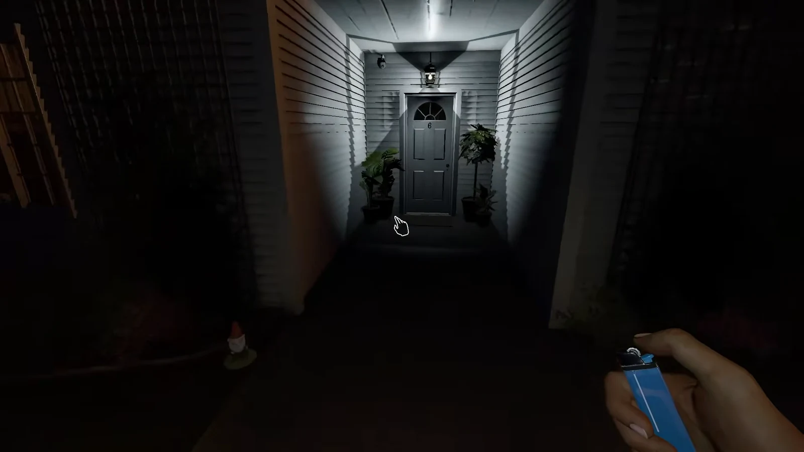 Front door interaction prompt on screen while the player holds a blue lighter