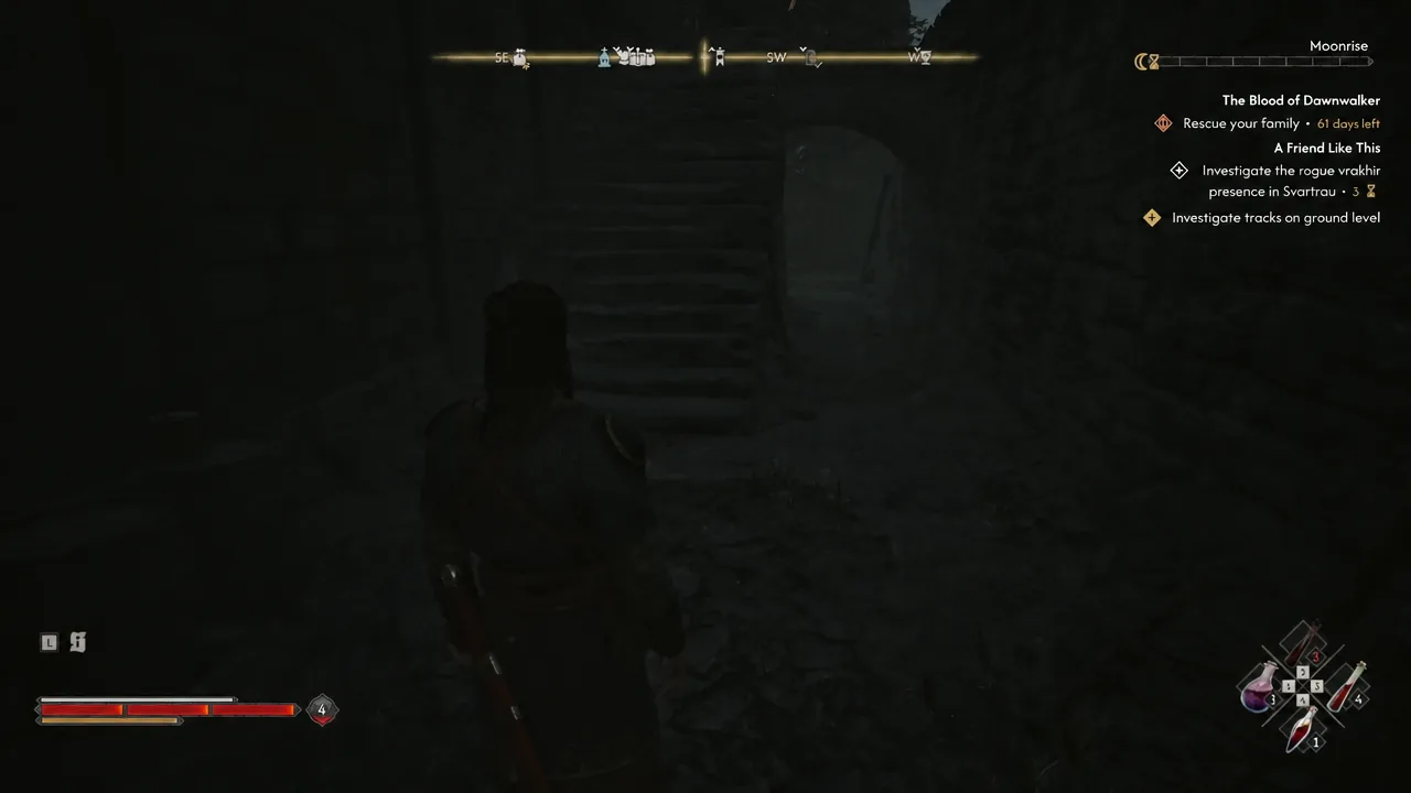 Coen climbing stone stairs in Svartrau with the ground-level tracks objective on screen