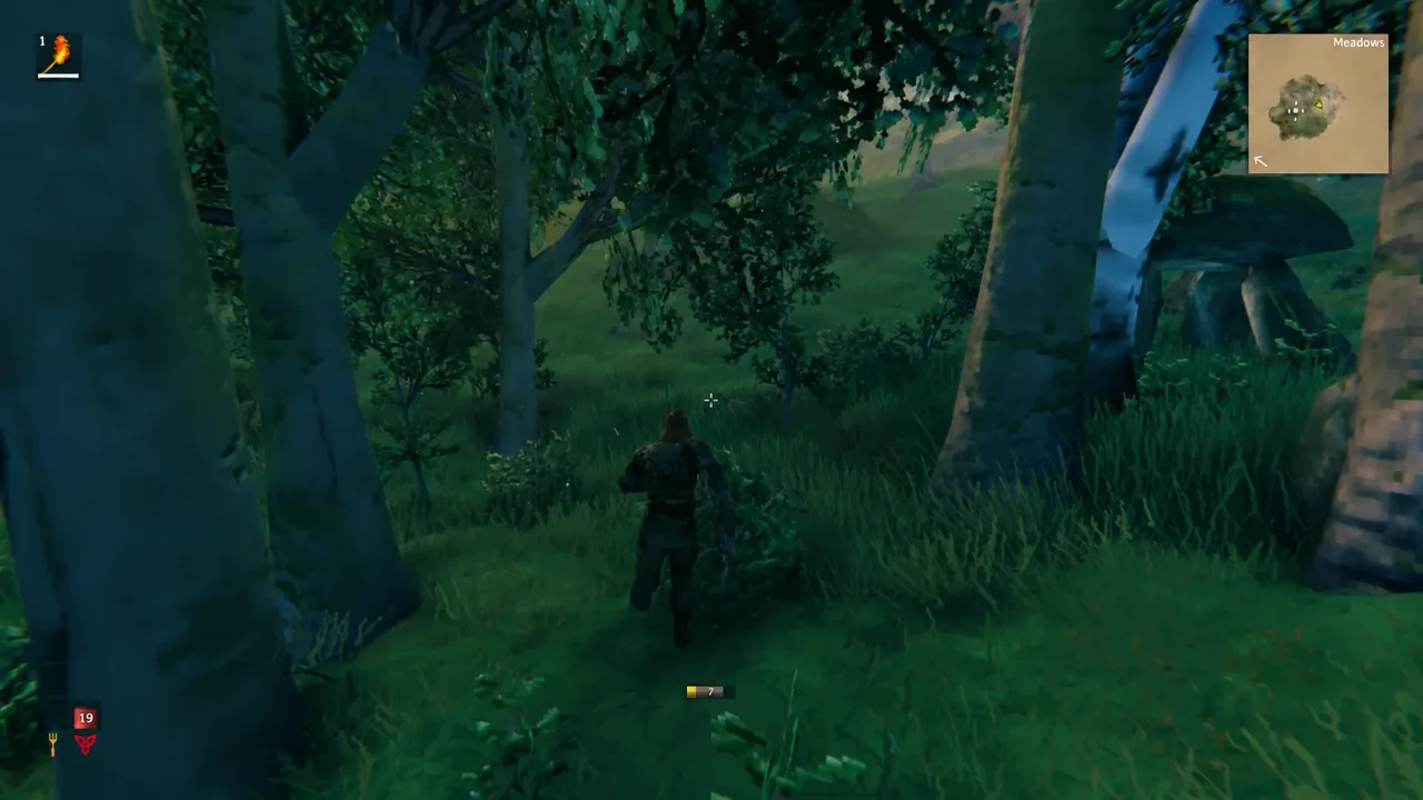 Viking character running through the grassy Meadows with the biome name shown on the minimap